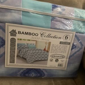 Silky flat and fitted sheet. Four pillow cases KINGED SIZED